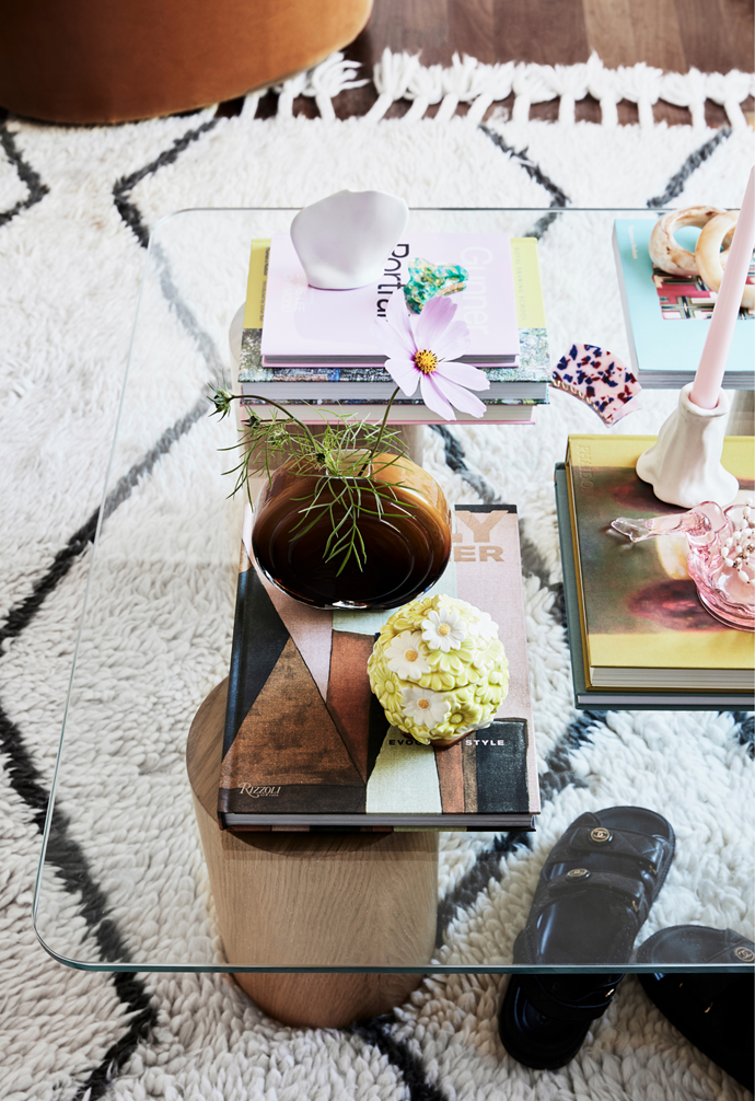 A Sarah Ellison coffee table makes for a stylish display space. Tomes from Kinokuniya elevate a vintage sugar bowl, a ballerina dish from Coming Soon and Valet Studio bangles and hair clips.