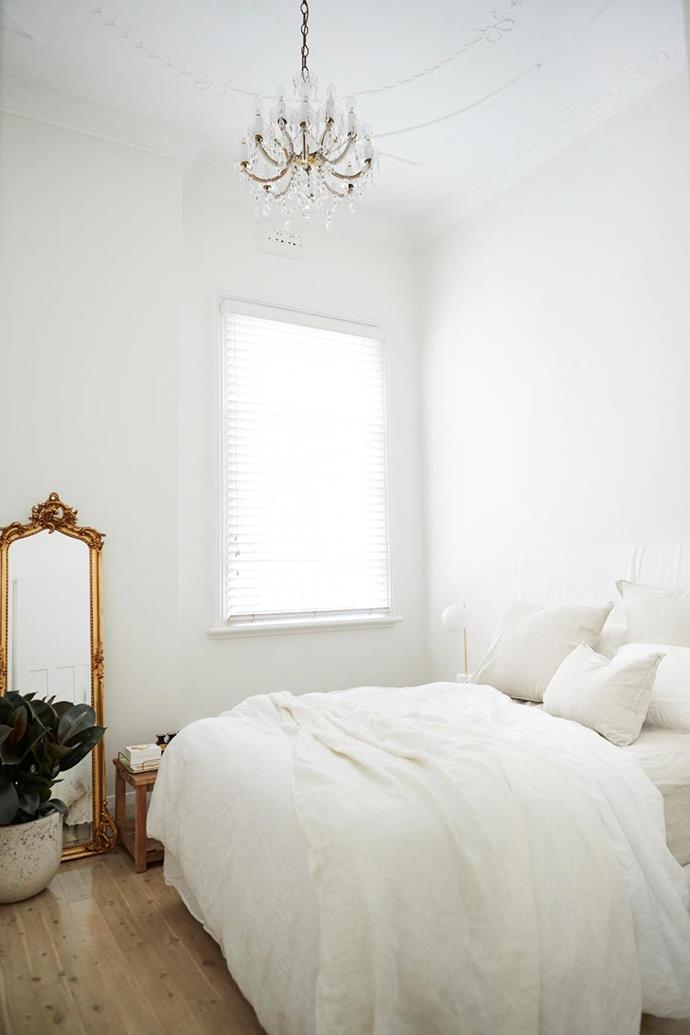 [Hayley Bonham was initially drawn to her home's "French charm"](https://www.homestolove.com.au/hayley-bonham-home-20627|target="_blank"), and uses layers of white in the bedroom to enhance its ornate details and create a serene atmosphere. 