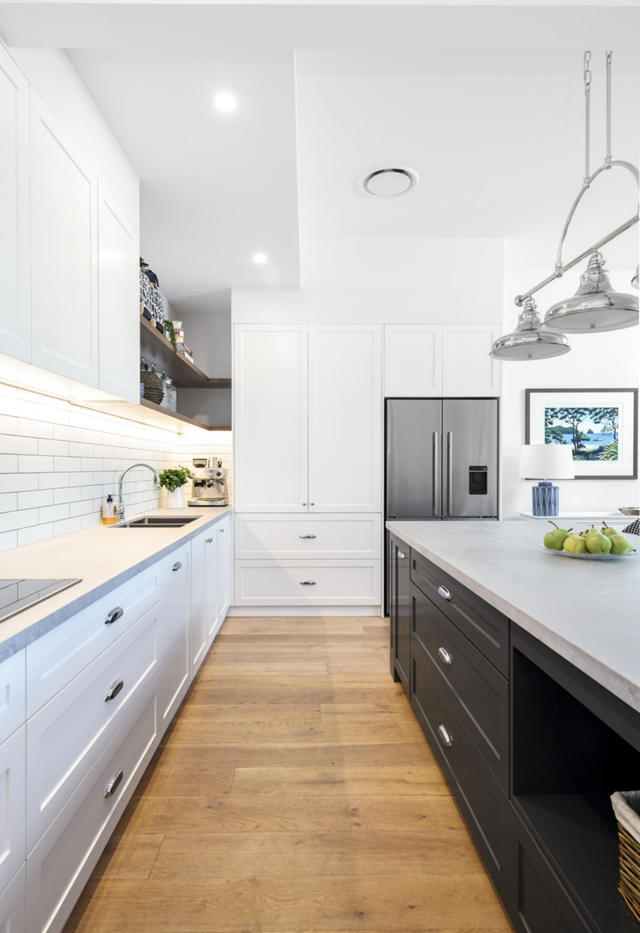 Generous benchtop space and integrated cabinetry allow for all of life's conveniences in this [coastal Hamptons kitchen](https://www.homestolove.com.au/before-after-coastal-hamptons-kitchen-22318|target="_blank").