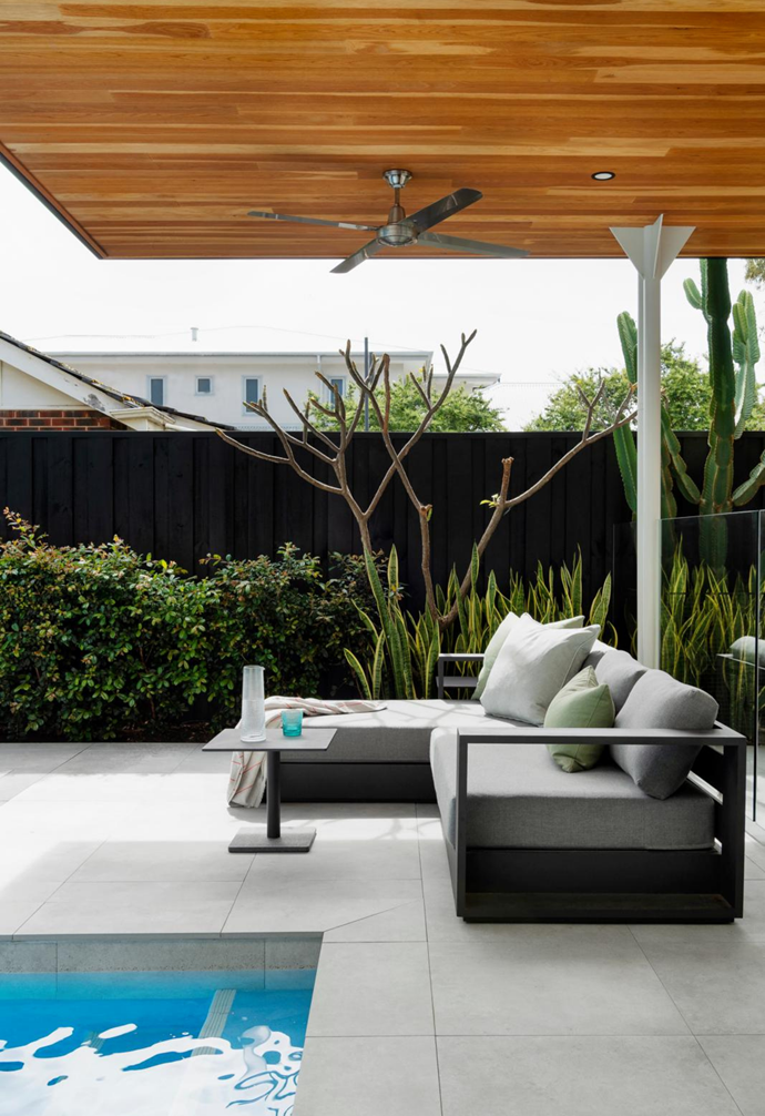 Summer or winter, rain or shine, this home's outdoor room is a magnet for the entire family. Harbour Outdoor's 'Hayman' lounge from Henri Living acts as the landing spot. To get a similarly relaxed luxe look, view the outdoor furniture range at Domayne. For a wide range of outdoor ceiling fans, try Bunnings.