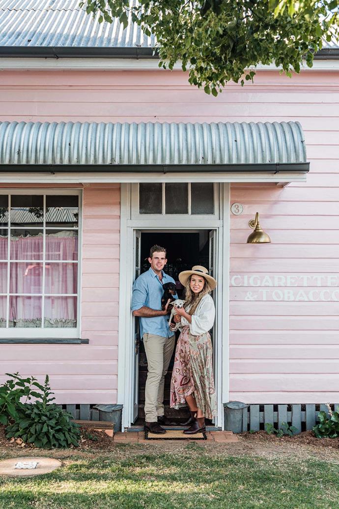 Once a corner store, this [grandmillenial pink weatherboard cottage](https://www.homestolove.com.au/grandmillennial-pink-cottage-22384|target="_blank") was crying out for the colourful and loving restoration brought upon it by now owners, Caitlyn and Sam (along with their two dogs). After ripping up carpet, sanding floors, painting, and replacing the walls with salvaged VJ panelling, the couple added French doors and leadlight windows to look out onto what would soon become a vibrant blooming garden.