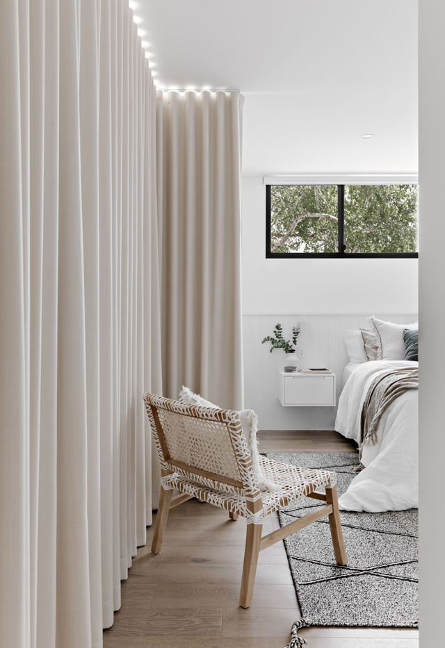 **CURTAINS:** Thick [floor-length curtains](https://www.homestolove.com.au/types-of-window-coverings-6899|target="_blank") create instant insulation and trap in the heat to keep your bedroom looking and feeling warm and homely all day long.