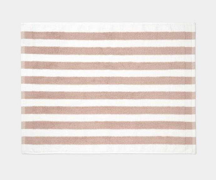 **[Stripe bathroom mat, $19.95, Aura Home](https://www.aurahome.com.au/stripe-bath-mat-blush|target="_blank"|rel="nofollow")**<br>
Even in the midst of winter, the Stripe bath mat from Adairs is sure to inject a delightful summer vibe into your space. This mat features a luxurious texture and come complete with European styled hand-knotted fringing and has been woven in a beautiful soft and super absorbant pure cotton. *Afterpay available*