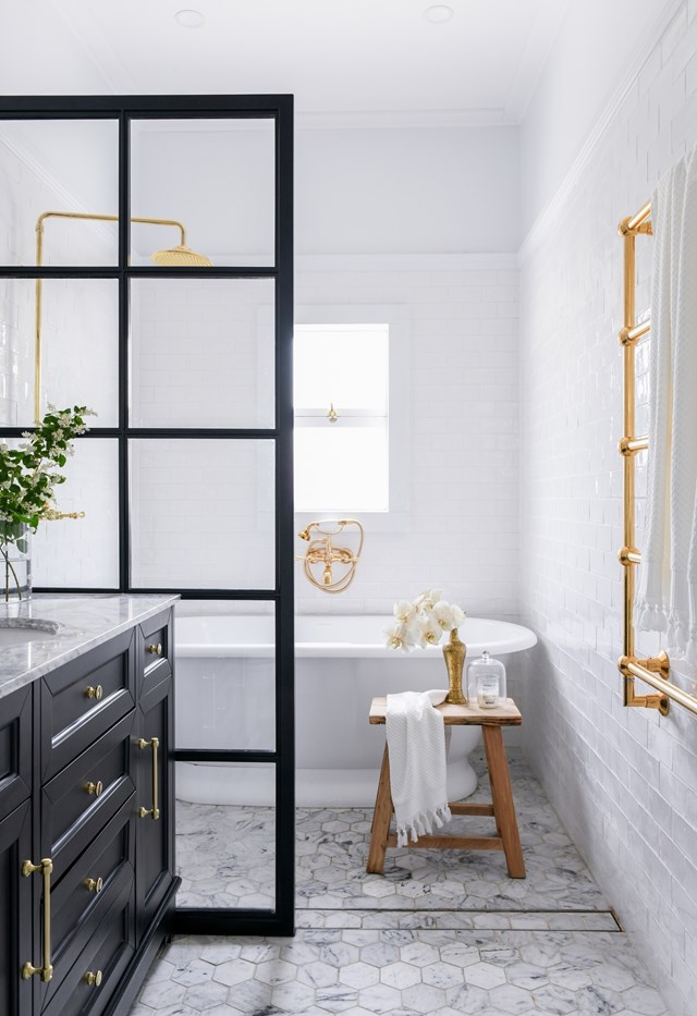 Tiles make a big statement leading right up to picture rail height in the chic bathroom of this [renovated cottage](https://www.homestolove.com.au/stylish-white-weatherboard-cottage-leura-22479|target="_blank") in the Blue Mountains.