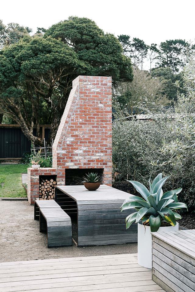 Living in an [airy beach shack](https://www.homestolove.com.au/renovated-mid-century-modern-beach-shack-flinders-22501|target="_blank") in the little fishing village of Flinders, on the Mornington Peninsula, is paradise for Bec Dentry. "We put a chimney outside so when we have friends over it's this warm, inviting place to relax," she says.
