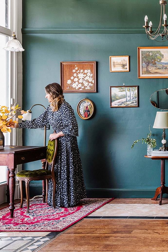 Green walls make a good backdrop for the vintage art Elise loves. "In the whole renovation, my main thought was, can I work with what I've got? I wanted to update it sensitively and sustainably rather than ripping everything out."