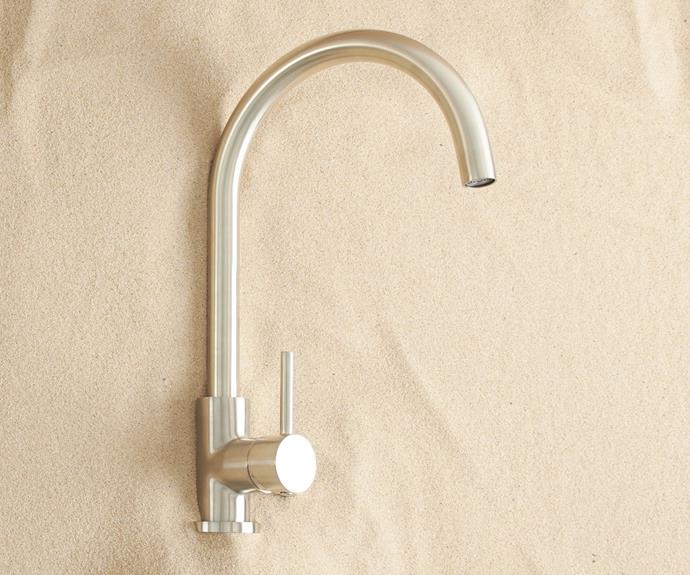 The [round kitchen mixer](https://go.linkby.com/NAGIQQFK/collections/warm-brushed-nickel/products/round-kitchen-mixer-warm-brushed-nickel|target="_blank"|rel="nofollow") in warm brushed nickel by [Yabby](https://go.linkby.com/NAGIQQFK|target="_blank"|rel="nofollow") is a timeless option that won't date as quickly as other trend-driven tapware finishes.