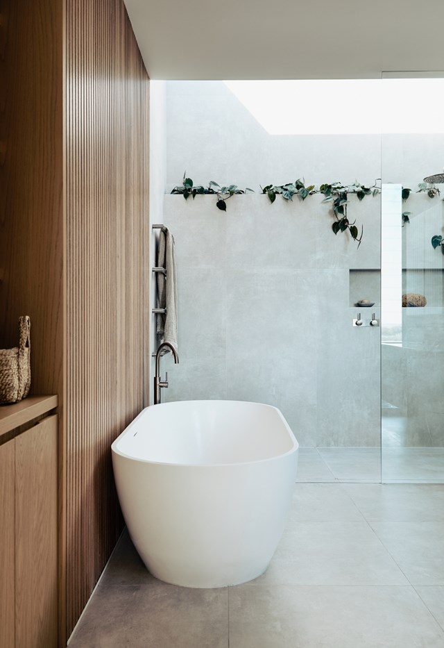 Bathrooms don't have to be sleek and shiny. Take this stunning room with its glorious mixture of textures – the concrete-look tiles provide a lovely contrast against the timber accents. It's also a combo that works well in a kitchen or laundry, so you can continue the look throughout your home.