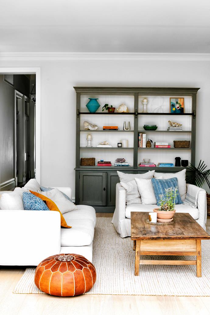 Adorned with owner Annika's artefacts and objects from a career in fashion, the living room of this revitalised [Federation bungalow in Sydney](https://www.homestolove.com.au/bright-federation-renovation-22943|target="_blank") is brimming with personality. Beyond this standpoint, the lush back garden and outdoor entertaining area opens up via bi-fold doors.