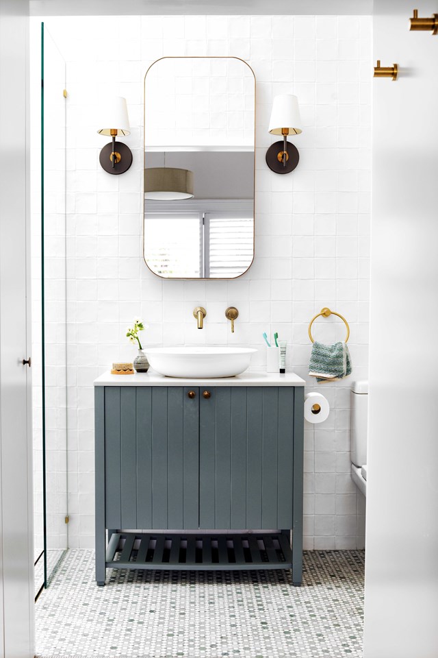 Stylistically, [this renovated federation bungalow](https://www.homestolove.com.au/bright-federation-renovation-22943|target="_blank") combines English, French provincial and coastal design influences, managing to make the bathroom both light and traditional. *Photo: Chris Court / Story: Inside Out*