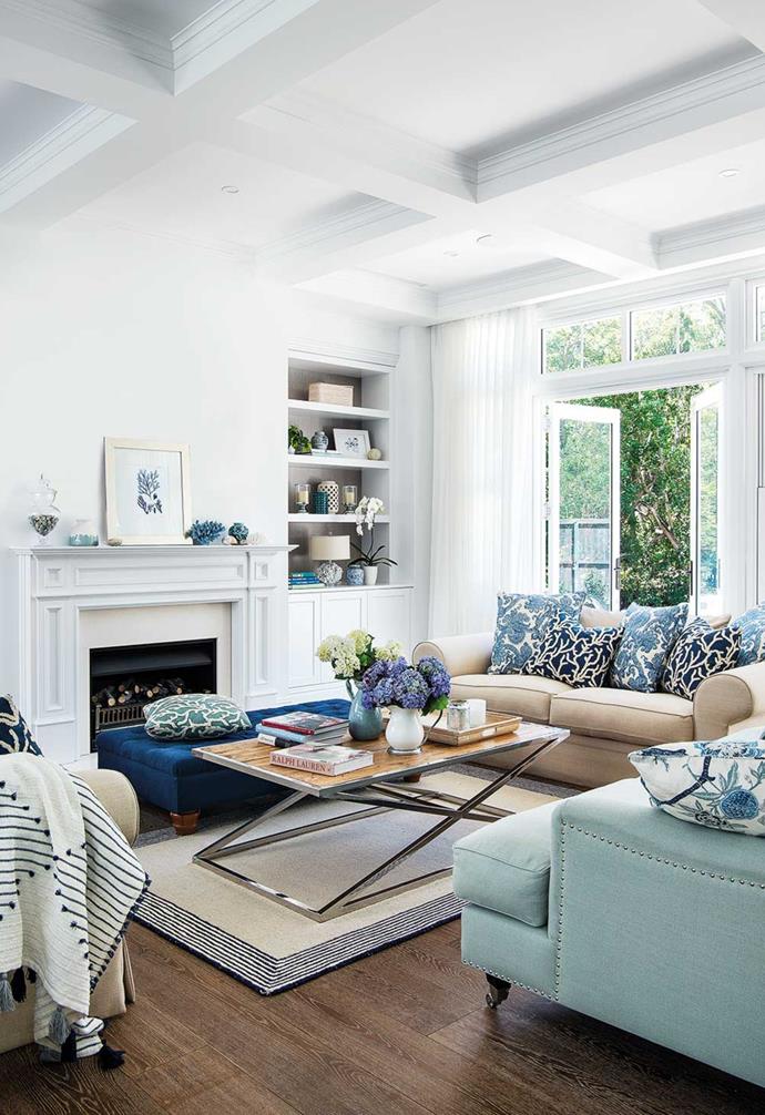 A [classic Hamptons style home](https://www.homestolove.com.au/classic-hamptons-home-22702|target="_blank") with a coffered ceiling in the living room.