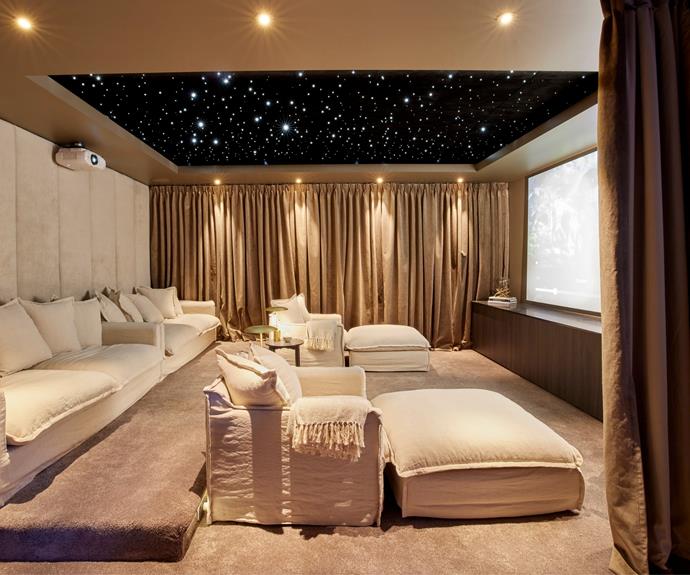 Take cues from Ronnie and Georgia's [home cinema from The Block 2021](https://www.homestolove.com.au/the-block-2021-basement-reveals-22949|target="_blank") when looking for ways to enhance sound. Curtains and carpet absorb sound and create a cocooning effect for cosy viewing.