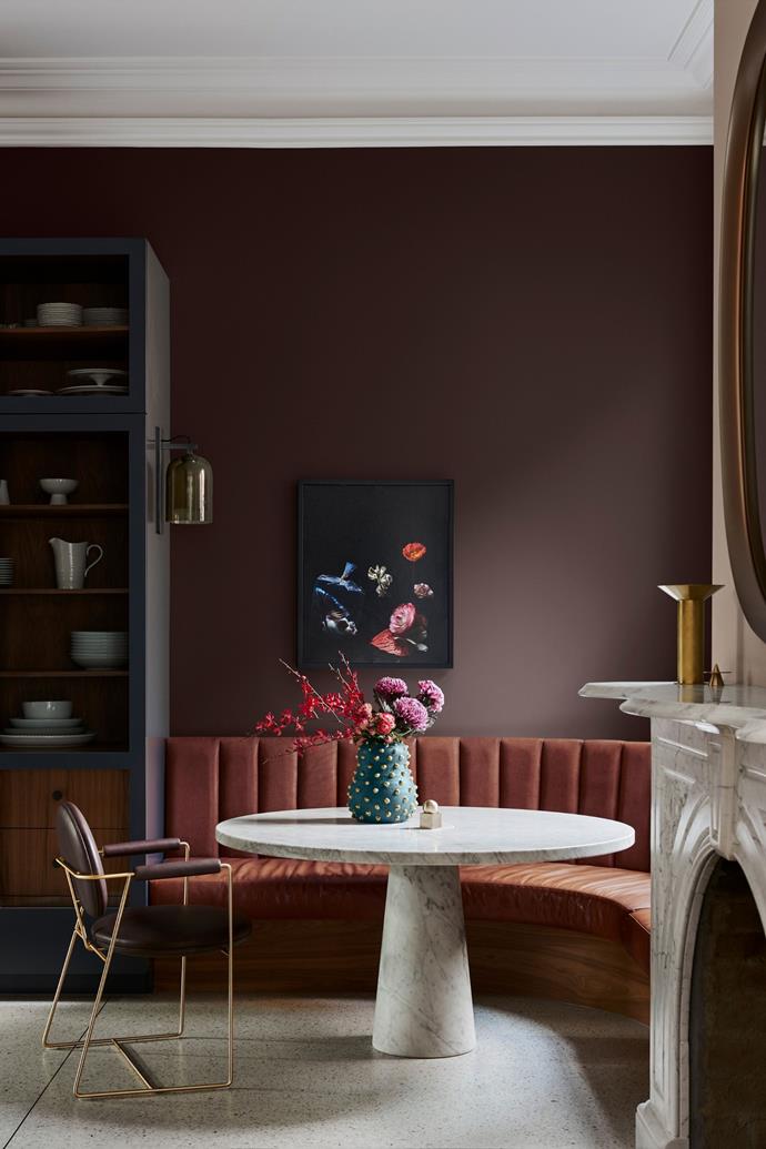 A cosy and intimate dining nook painted in Dulux Dark Door. The ceiling is painted in Dulux White Dune Quarter. "In Dreams" original photograph by [Lilli Waters](https://www.moderntimes.com.au/shop/art/photography/in-dreams-original-photograph-by-lilli-waters/|target="_blank"|rel="nofollow"). 