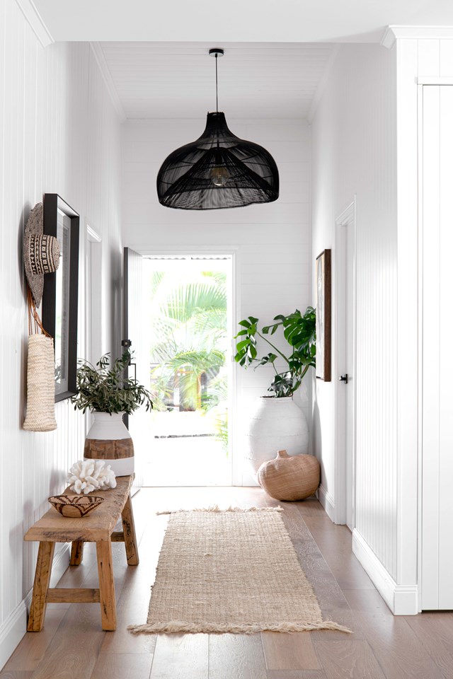 VJ panelling lines the entrance halls in [this light and bright renovated Queenslander](https://www.homestolove.com.au/queenslander-workers-cottage-renovation-22995|target="_blank") and continues into the living spaces.