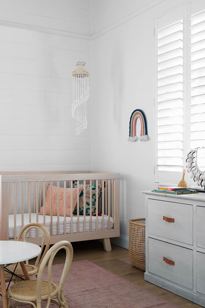 **NURSERY**  An important piece in Goldie's room is the old chest of drawers refurbished by Jordan. Rattan chairs, [Abide Interiors](https://abideinteriors.com.au/|target="_blank"|rel="nofollow"). Patterned cushion, [Bonnie And Neil](https://bonnieandneil.com.au/|target="_blank"|rel="nofollow"). Rainbow, Kmart. Shell chandelier, from a Byron market.
