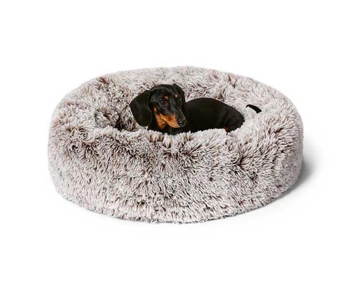 **[Snooza faux fur cuddler pet bed, from $87.99, PetBarn](https://www.petbarn.com.au/snooza-faux-fur-cuddler-dog-basket-mink|target="_blank"|rel="nofollow")** 
<br>
For anxious cats and dogs, nothing beats the warm embrace of a cuddle bed. The Snooza is proudly Australian made and owned, and features a luxuriously soft faux fur cover paired with sturdy raised wals. The bed is 100% machine washable (yes, even the filling), which makes it easy to clean and maintain. If the filling ever loses its bounce, this bed can also be topped up with extra Snoozafill, a foam made from recycled PET fibre mix. **[SHOP NOW](https://www.petbarn.com.au/snooza-faux-fur-cuddler-dog-basket-mink|target="_blank"|rel="nofollow")**.