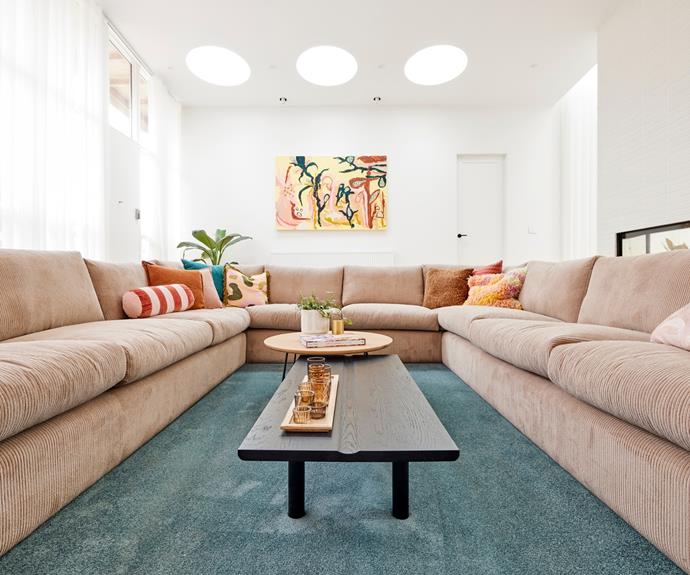 Jade green carpet in [Tanya and Vito's sunken lounge room on The Block](https://www.homestolove.com.au/the-block-2021-living-and-dining-room-reveals-23016|target="_blank") is central to the mid-century driven colour scheme.