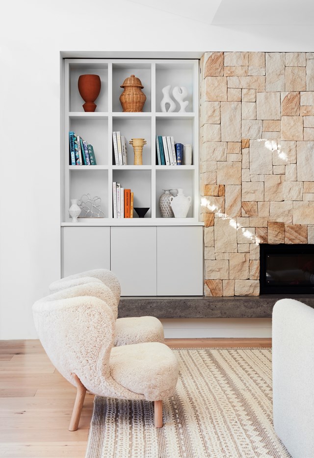 The brief to banish the bland and elevate the mood of [this light, bright family home](https://www.homestolove.com.au/light-contemporary-home-sydney-23024|target="_blank") included being clever with texture to include this modern stone fireplace in the main living area.