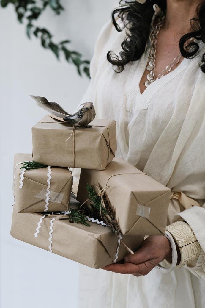 The presents at [Lynda Gardener's house](https://www.homestolove.com.au/federation-era-cottage-trentham-19487|target="_blank") are simply wrapped in brown paper and twine, then decorated with ric-rac ribbon and pine-needle sprigs.