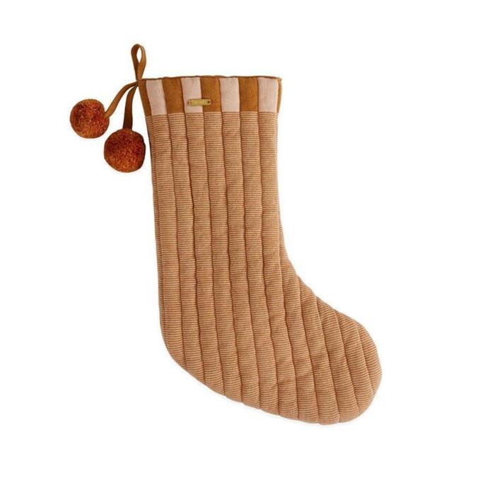 **[Laja Christmas stocking in caramel, $99.95, Nordic Fusion](https://www.nordicfusion.com.au/laja-christmas-stocking-caramel|target="_blank"|rel="nofollow")**<br> 
Made from 100% cotton knit, this plush caramel stocking would suit those who opt for something other than the traditional red and green Christmas palette. Afterpay available.