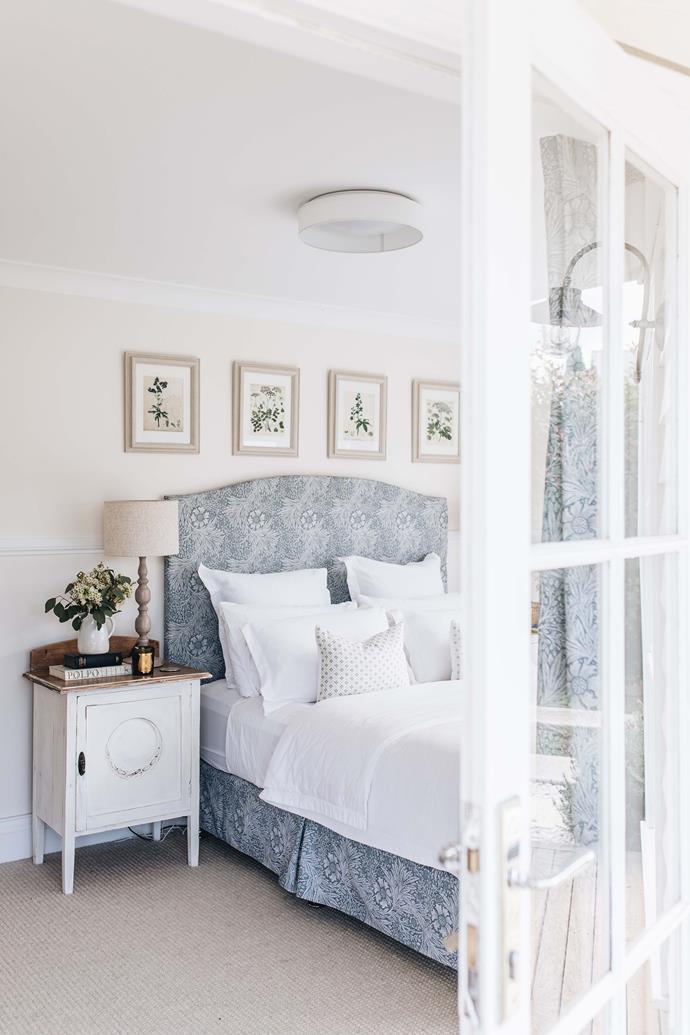 At [Sinclairs of Berry](https://www.homestolove.com.au/sinclairs-of-berry-nsw-farmstay-23113|target="_blank"), each bedroom features a formal yet relaxed style. Owner Caroline Sinclair upholstered many of the beds in the home herself. Here, the bedhead is covered in William Morris fabric. "My mum, Valerie, taught my sister and me how to sew at a young age," she says.