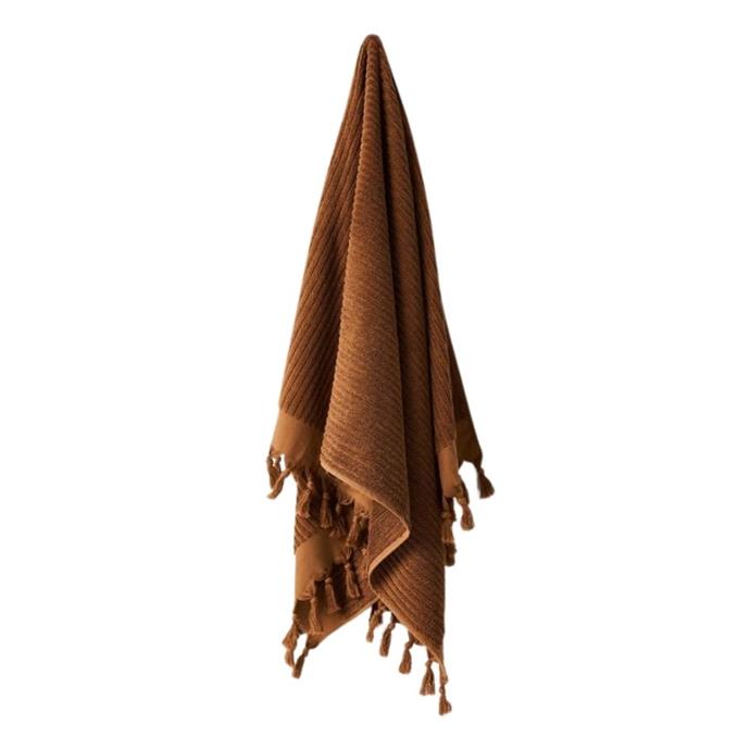 **[Paros rib bath towel in bronze, $49.95, Aura Home](https://www.aurahome.com.au/paros-rib-bath-towel-bronze|target="_blank"|rel="nofollow")**<br>
<br>Woven from sustainably sourced cotton, Paros is a beautifully soft and highly absorbent bath towel. It features hand-knotted fringes that will add texture to your bathroom and is available in a range of stunning colours. Afterpay available. **[SHOP NOW](https://www.aurahome.com.au/paros-rib-bath-towel-bronze|target="_blank"|rel="nofollow")**