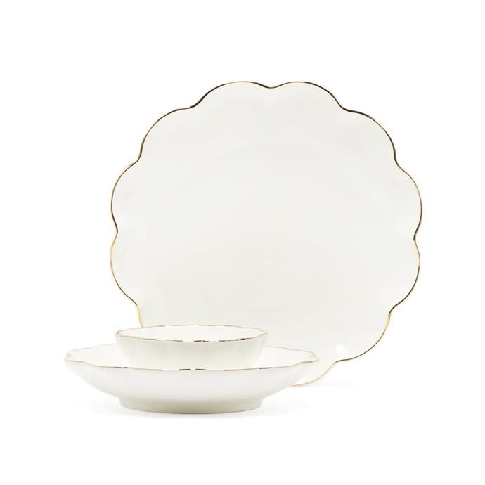 **[Aerin set of three gold-rimmed ceramic dishes, $487, Matchesfashion.com](https://www.matchesfashion.com/au/products/Aerin-Set-of-three-gold-rimmed-ceramic-dishes-1343391|target="_blank"|rel="nofollow")** <br> 
The gold rim on these minimal plates has been hand-painted, and they are designed to stack while dressing the table. Coming in a set of three, the scalloped edge even gives a slight nod to a more coastal style.