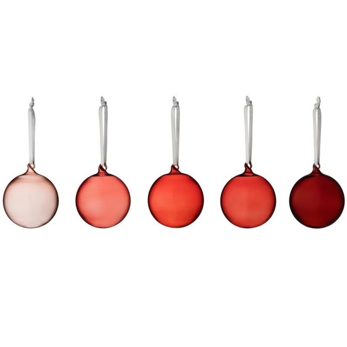 **[Iittala glass ball set in red, $63, Finnish Design Shop](https://www.finnishdesignshop.com/decoration-decorative-objects-glass-objects-glass-ball-set-pcs-red-p-19375.html|target="_blank"|rel="nofollow")**<br>
These five glass baubles by Iittala come in varying shades of red and are a timeless piece for your Christmas tree. Made from mouth-blown glass, the transparent ornaments each glow a unique colour when backlit.