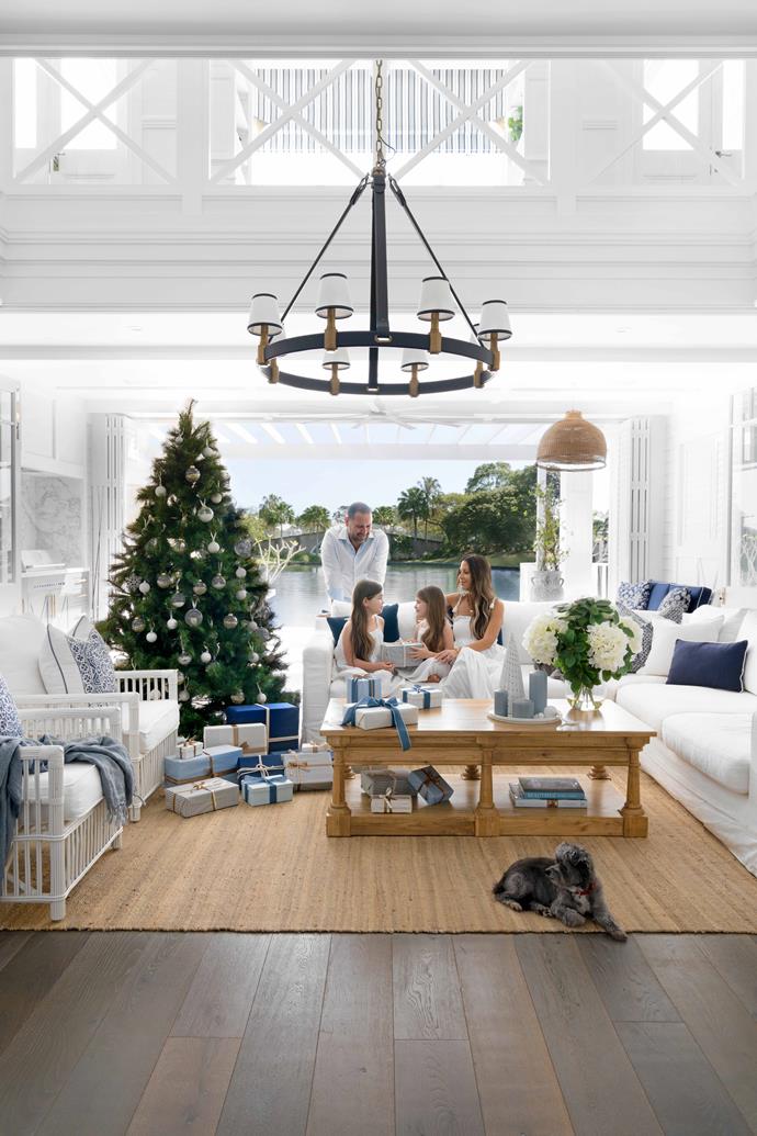 **HOLIDAY TIME** Come Christmas, there's no place Kristy, her husband Trent and daughters Chloé, eight, and Willow, five, would rather be than at home with their beloved dog Ralphy. "I love how the house can open up everywhere and capture the sun, view and breezes," says Kristy.