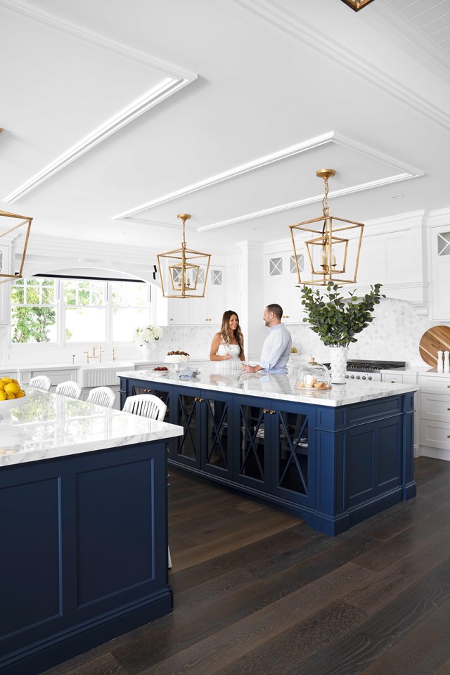 Dipping your toe into a bold colour can start with introducing your favourite hue to a featured area in your kitchen, as seen in the oversized kitchen islands of [this coastal family Hamptons-style home](https://www.homestolove.com.au/hamptons-christmas-home-23131|target="_blank").