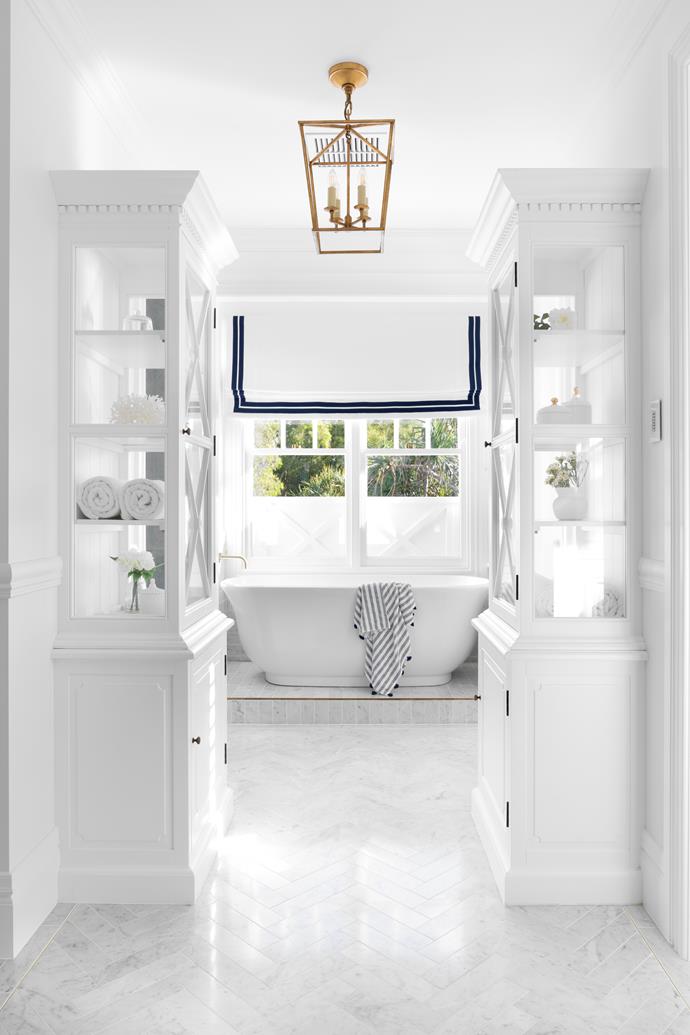 **ENSUITE** "I wanted the ensuite to feel luxurious and romantic with beautiful marble floors, elegant cabinetry and a big tub to soak in. I love the result," says Kristy.
