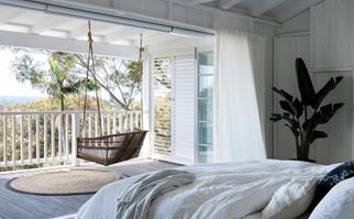 Coastal indoor outdoor bedroom