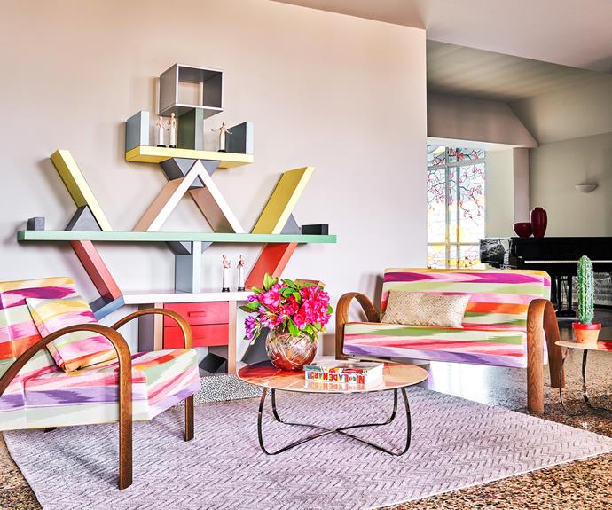 A Carlton bookcase by Ettore Sottsass commands attention in the sitting area.