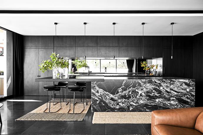 The Polytec Ravine kitchen joinery in Black Wenge was designed by Sally Furrugia and installed by Northern Kitchens and Joinery. The kitchen island is in Black Forest granite from WK Stone. BCN slide base stools from Fanuli.