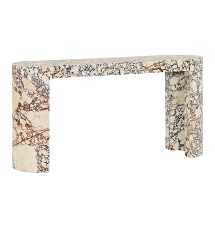 **[Veneta console table, $2995, Coco Republic](https://www.cocorepublic.com.au/config-459304-veneta-console-table.html|target="_blank"|rel="nofollow")**<br> 
With a smooth, curvaceous form, the Veneta marble console table sure does make a statement. The veins on each piece are completely unique, making it a beautiful addition to your living space or hallway. Also available in a travertine.