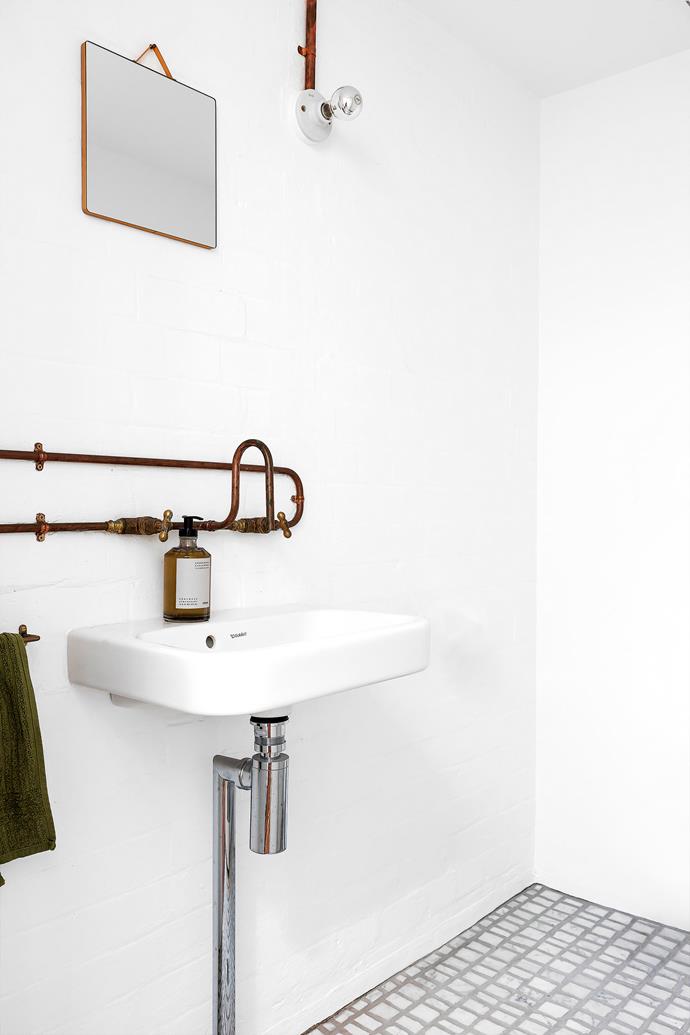 A creative plumber rigged up the sink with pre-existing copper pipes and taps from Bunnings. Ruban mirror, [Hay Shop](https://hayshop.com.au/|target="_blank"|rel="nofollow"). Frama hand soap, [Oliver Thom](https://oliverthom.com.au/|target="_blank"|rel="nofollow").
