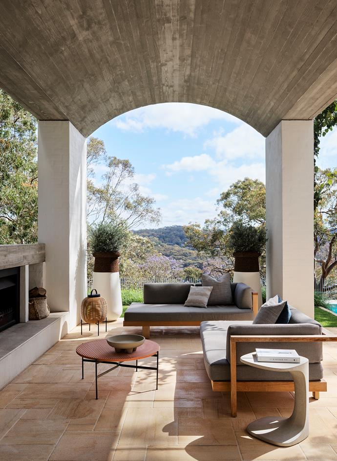 This [Mediterranean-style property in Castlecrag](https://www.homestolove.com.au/1950s-home-mediterranean-style-makeover-22097|target="_blank"), with glimpses of Middle Harbour, could easily be in Portugal. With bougainvillea shooting on the concrete columns framing the new garden room, this relaxed residence is now home to a couple with two children.