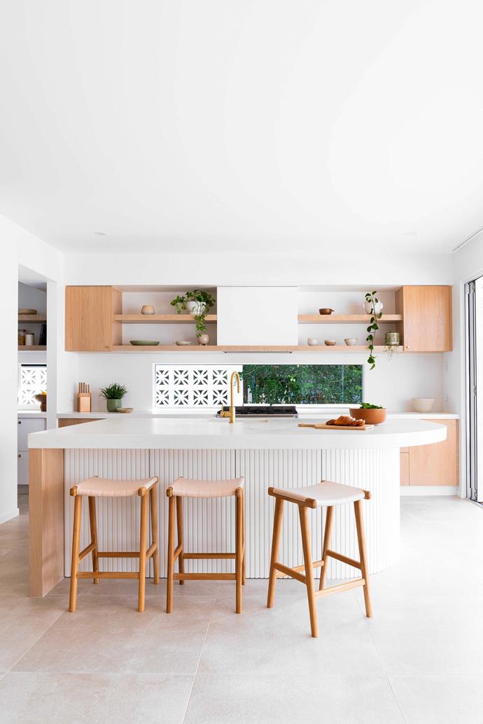 Sun-drenched spaces are aplenty in [this stunner](https://www.homestolove.com.au/gold-coast-textural-sun-drenched-home-23215|target="_blank") on Queensland's infamous Gold Coast. The warm feeling continues throughout the home via colour and material choices, creators Kellie and Scott leaning in to texture and tonal variation to communicate the home's coastal aesthetic. "We worked hard to get the flow and continuity right and I think we pulled it off."