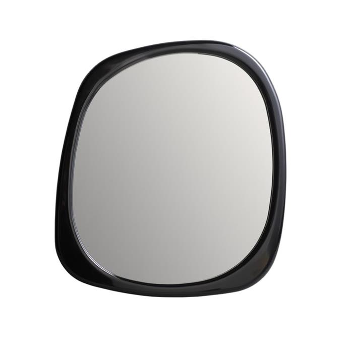 **[Brooke mirror in black, $1936, Greg Natale](https://www.gregnatale.com/product/brooke-mirror-black/|target="_blank"|rel="nofollow")**<br> 
The simple, subtle asymmetry of this black mirror by Greg Natale makes it a gorgeous wall piece with timeless style. Featuring smooth flowing curves, it also comes in white.