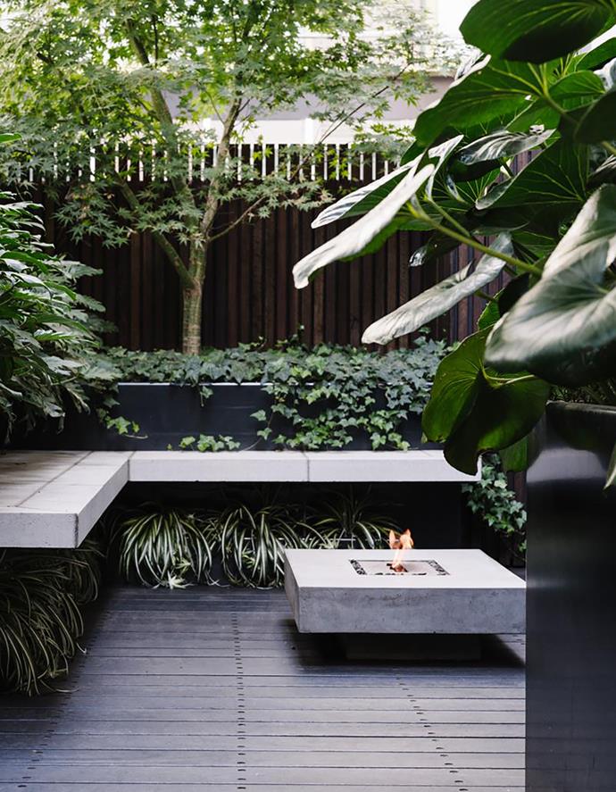 The cleverly cantilevered L-shaped bench and matching fireplace at [this inner-city terrace](https://www.homestolove.com.au/garden-inner-city-terrace-12786|target="_blank") ensures the outdoor garden room remains a destination, even in the cooler months.