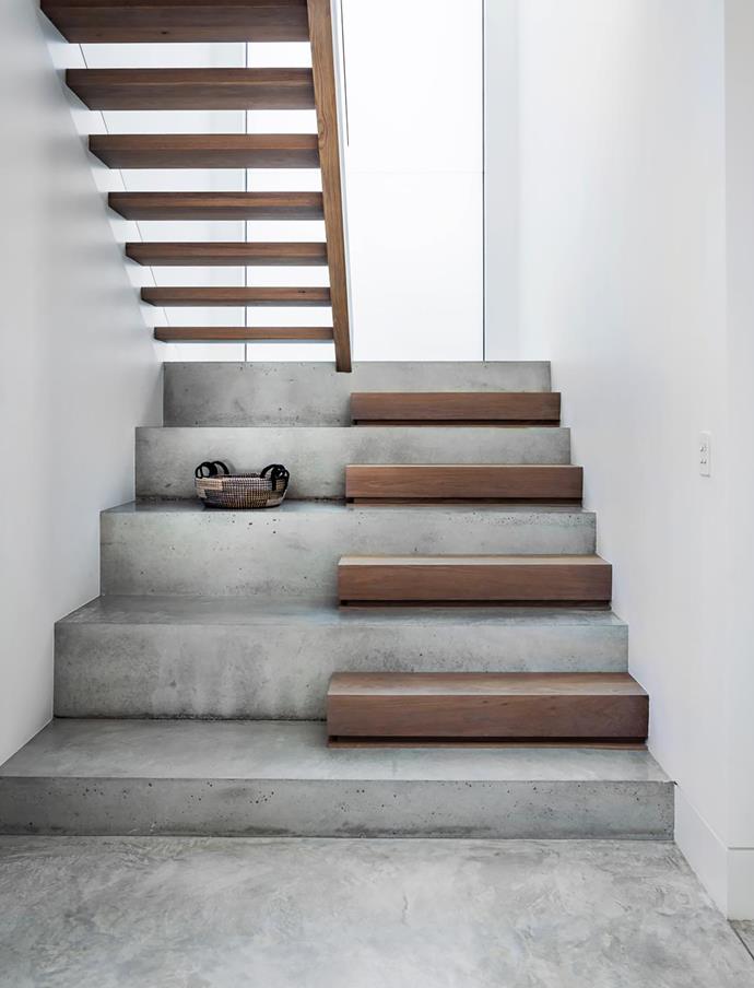 The stairs in [this modern yet timeless family home](https://www.homestolove.com.au/modern-yet-timeless-family-home-sydney-21113|target="_blank") are polished concrete with European oak treads, making for a beautiful design accent. 