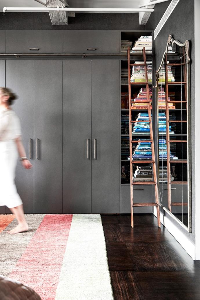 Nicole increased the wardrobe space by building up to the ceiling and installing a 'library' accessed via a ladder by [Groth & Sons](https://www.grothandsonsinteriors.com.au/|target="_blank"|rel="nofollow").  "We added doors by [Betterbuilt Furniture](https://www.betterbuiltfurniture.com.au/|target="_blank"|rel="nofollow"), which we finished in a Laminex laminate," she says. Mirror, [Le Forge](https://www.leforge.com.au/|target="_blank"|rel="nofollow").