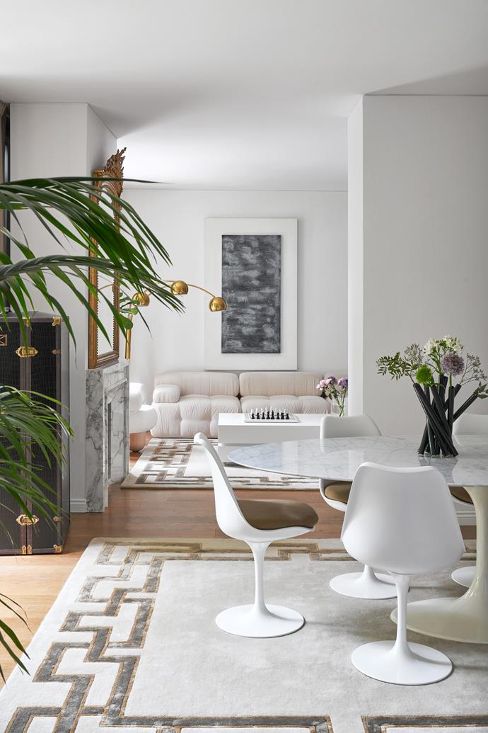 Homeowner Barbara Borghini says she loves all shades of "nude, beige, off-white, brown and ecru", so it was only natural that she fell in love with this minimally designed home and its neutral scheme. Its ultra-modern design makes it quite unique in a city like Florence, which is known for its opulent architecture. A dining room with an Eero Saarinen 'Tulip' table leads to the living room with a custom sofa, vintage lamps, an Alfredo Rapetti artwork and Formica coffee table by architect Roberto Monsani, who designed this very home.