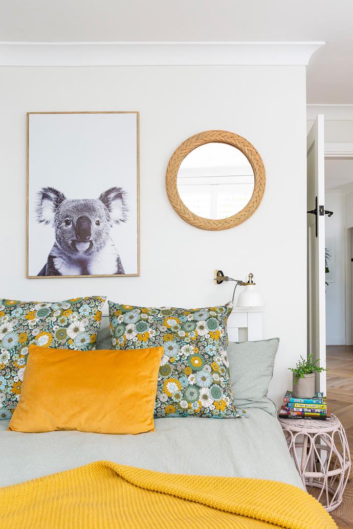 A framed koala print from Kmart sits above Willow's bed. Cushions from Adairs.