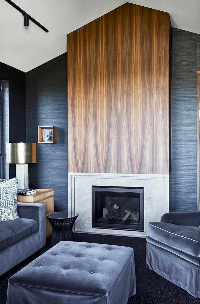 The rich turquoise grasscloth wallpaper in the upstairs sitting room of [this modernist, art-filled semi in Sydney](https://www.homestolove.com.au/modernist-art-filled-home-22578|target="_blank") was selected to tie in with the moody neutral interiors with splashes of black and indigo. 