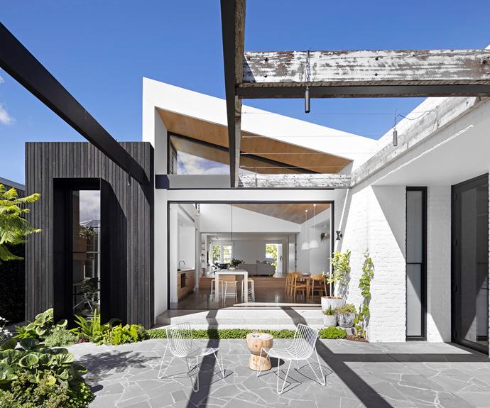 Eclectic materials give this area real personality. "We didn't want it to feel sterile," says owner Storrm. Recycled beams, [Jaks Timber](https://jakstimber.com.au/|target="_blank"|rel="nofollow"). Charred cladding, [EcoTimber](https://www.ecotimbergroup.com.au/|target="_blank"|rel="nofollow"). Bluestone crazy paving, [Core Pave](https://www.corepave.com.au/|target="_blank"|rel="nofollow"). Tio easy chairs, [In Good Company](https://ingoodcompany.com.au/|target="_blank"|rel="nofollow"). Eggcup stool, [Mark Tuckey](https://www.marktuckey.com.au/|target="_blank"|rel="nofollow").