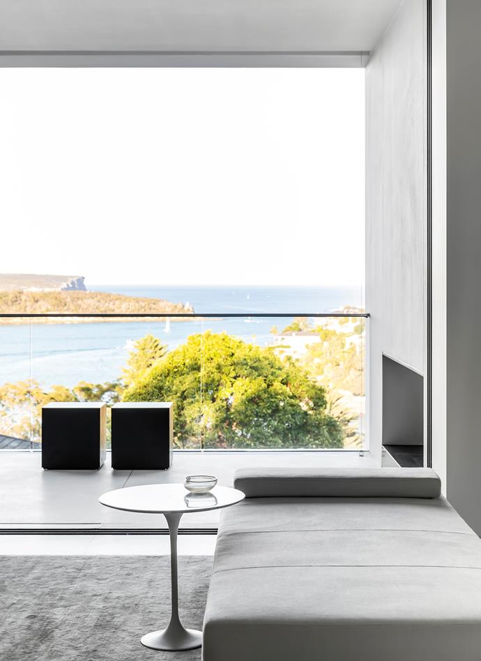 Anchored by a magnificent gum tree and a powerfully minimal palette, the design of [this new minimalist harbourside home](https://www.homestolove.com.au/modern-minimalist-monochrome-home-22381|target="_blank") is pure luxury. Homeowner Jack Freeman says the brief called for "a permanent holiday home" that felt both sophisticated and serene, and architect Phillip Mathieson delivered.