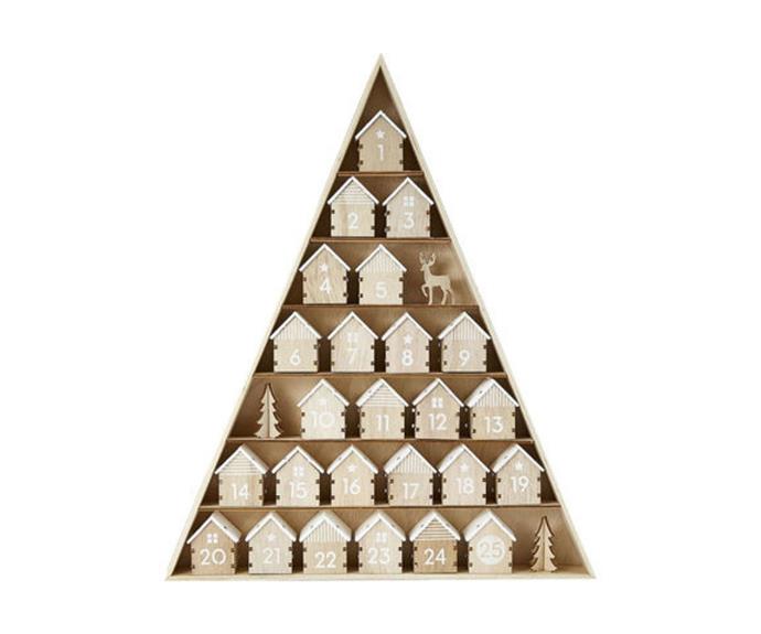 **[Advent Calendar - Mini House. $12](https://www.kmart.com.au/product/advent-calendar---mini-house/3774353|target="_blank"|rel="nofollow")**

This plywood advent calendar is decidedly luxe, and frankly we can't believe the price. 
