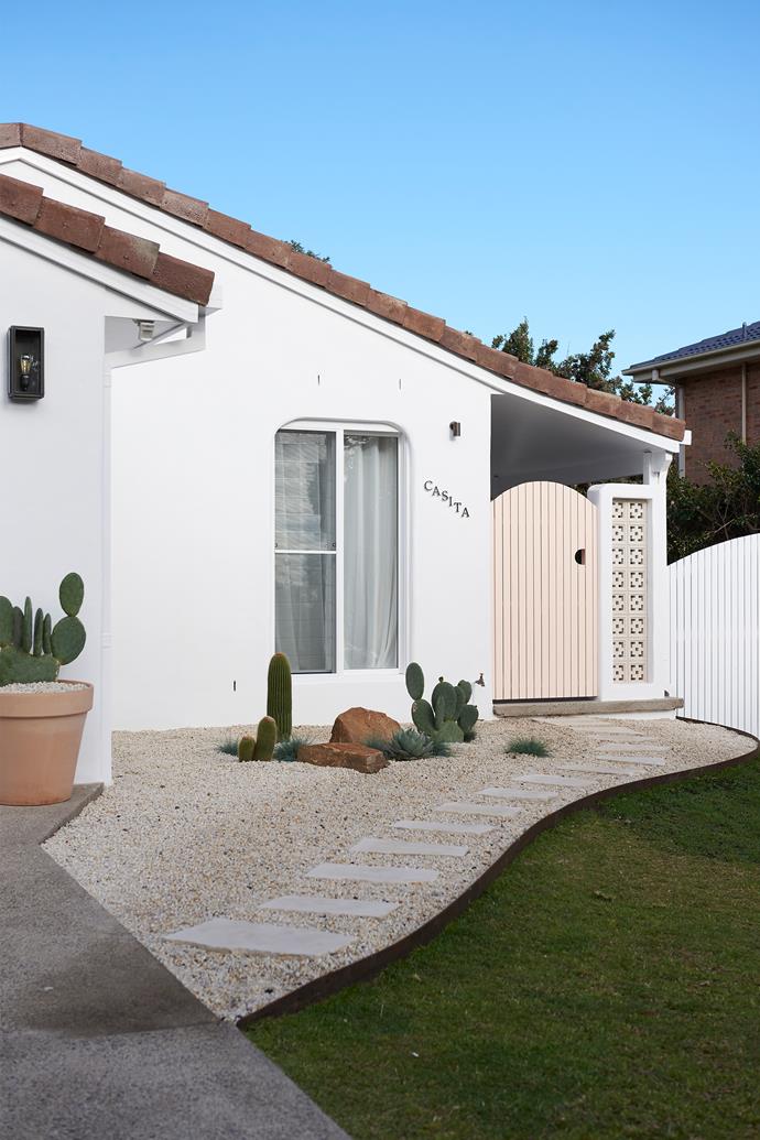It was originally a classic 90s brick home, but with the colour of the roof tiles and the sloping shapes of the home, Heidi saw the potential to reimagine it as a Spanish-style villa. The exterior is Haymes Paint's 'Chalky White', and the pink accents are 'Tangelo Cream'.