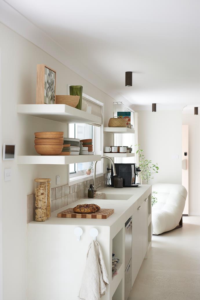 The kitchen shelves are a work of art, stocked with numerous different boutique Australian homewares brands. The artwork is Whitney Spicer, the ceramic bowls are from Cisco & The Sun, and the moss green vase is from [iittala](https://www.myer.com.au/p/iittala-alvar-aalto-vase-251cm-moss-green|target="_blank").  